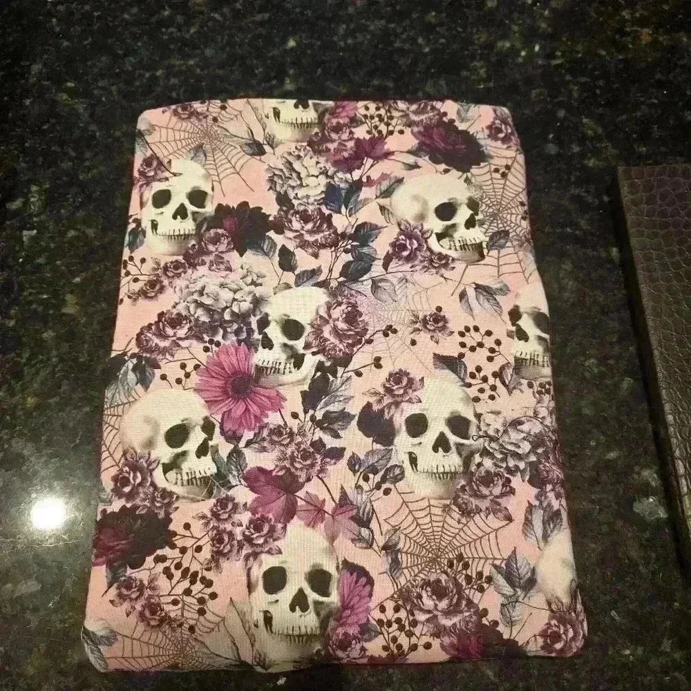 Pink and skulls 8.5 by 11 book kindle laptop sleeve